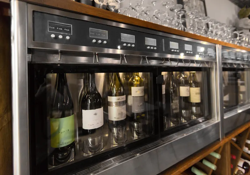 Wine refrigerator stocked with bottles